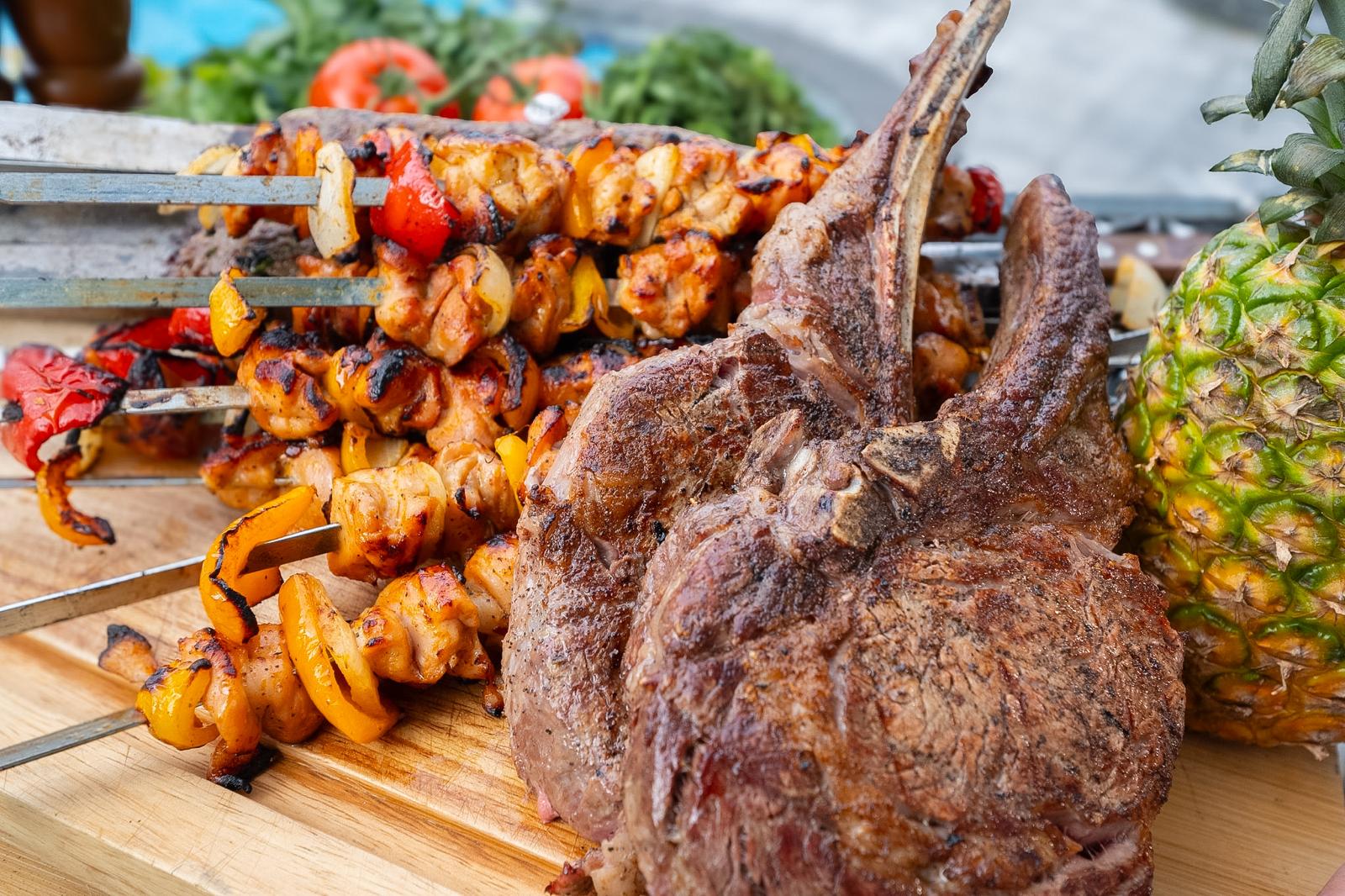 Grilled meats and colorful skewers ready to serve